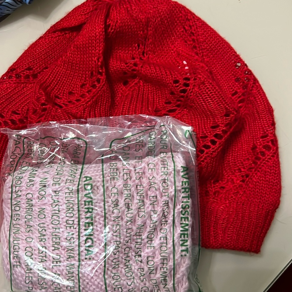 Just in- 2 knitted scull hats- girls pink and red